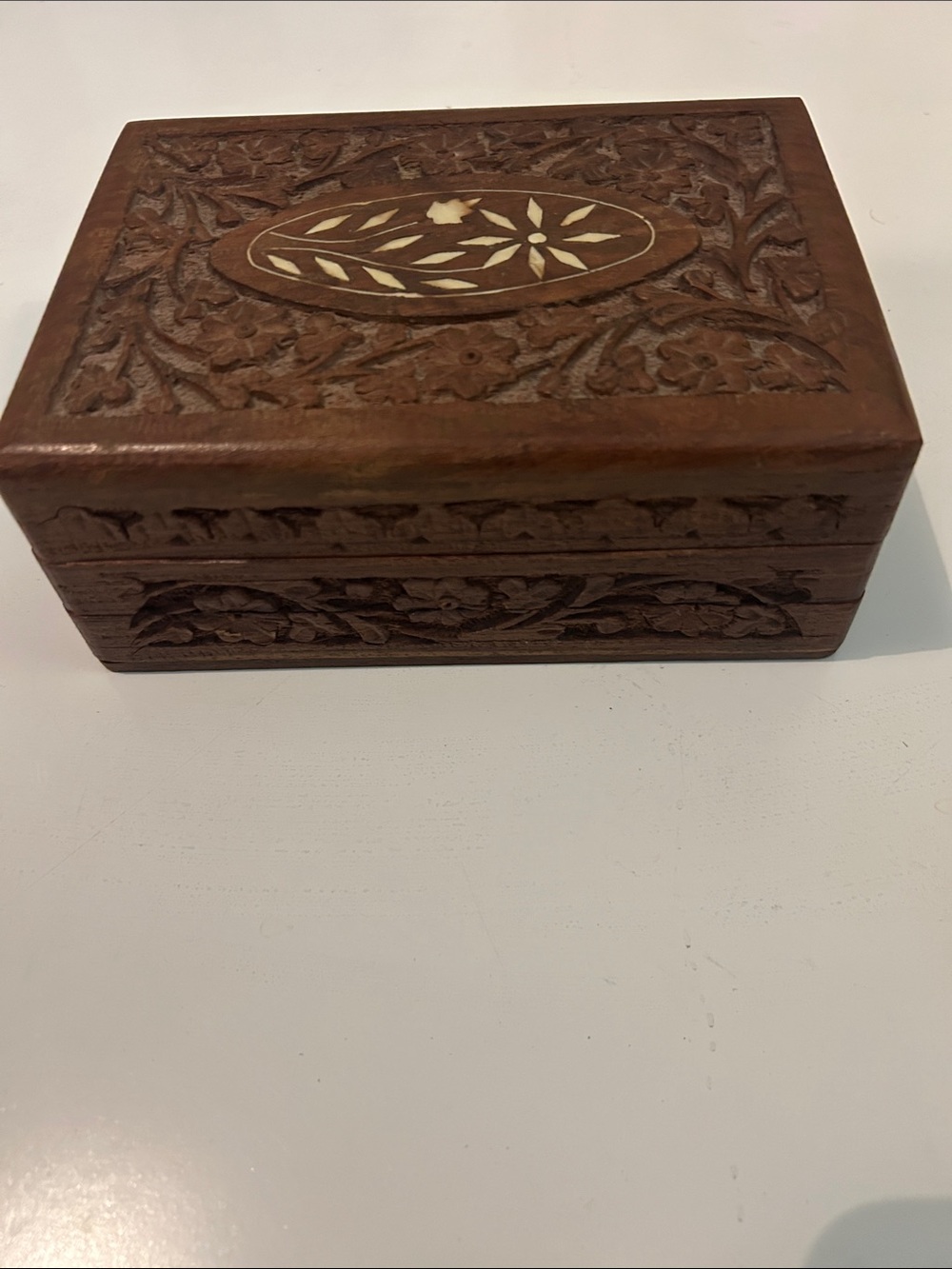 Hand-Carved Brown Wooden Keepsake Box with Inlaid Floral Motif
